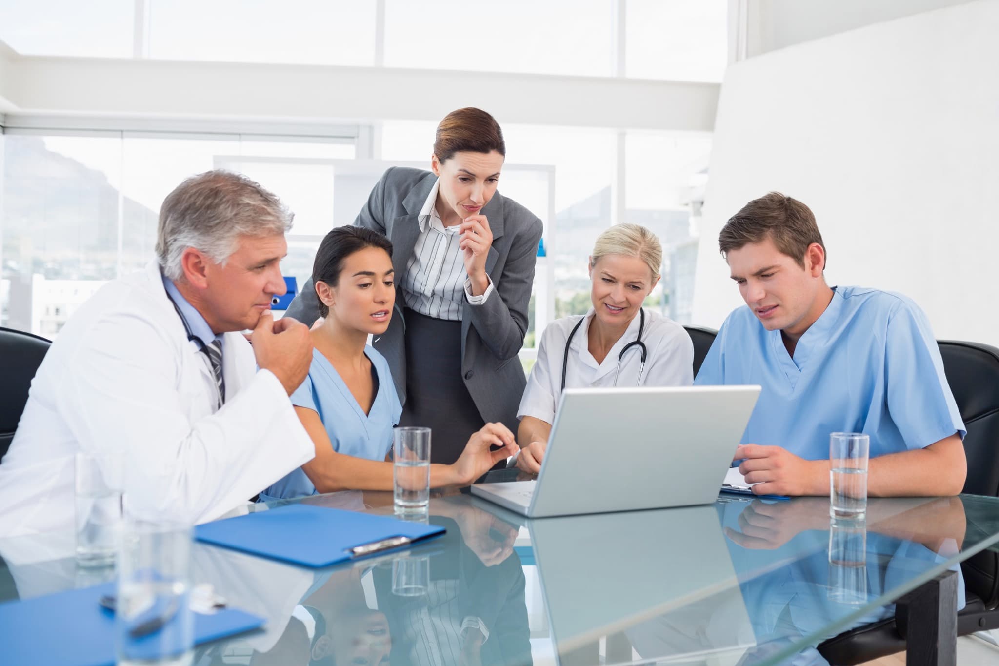 Clinical research team in active study planning meeting